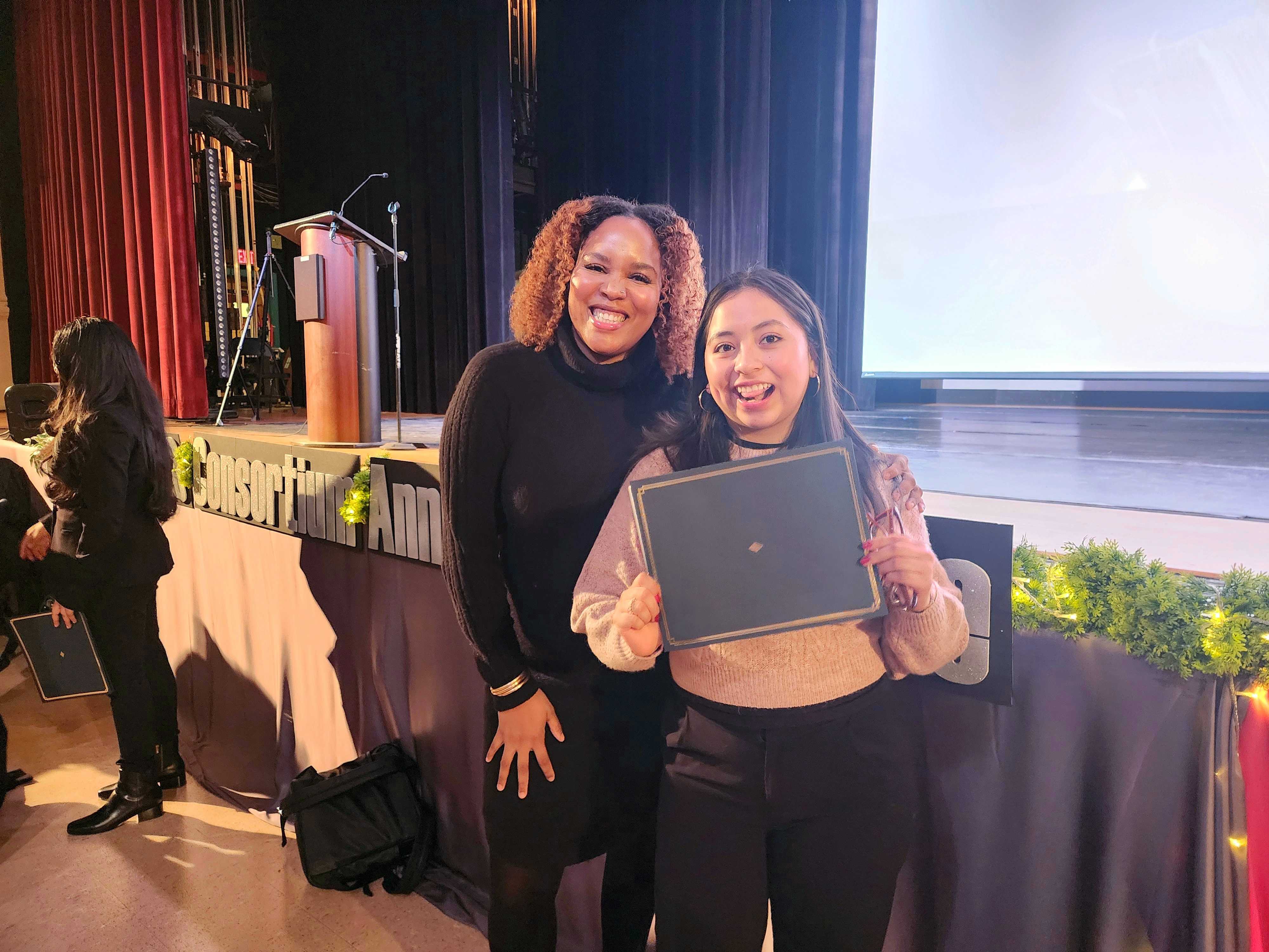 Scholar receiving award